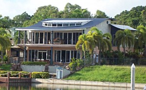 An image of a house with a metal roof. 