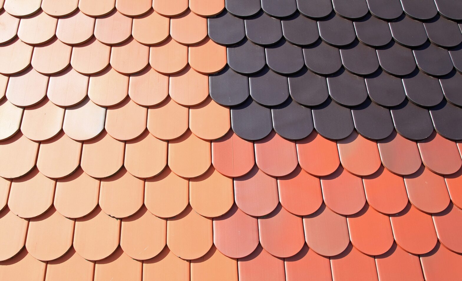 Close up image of multicoloured tiled roof