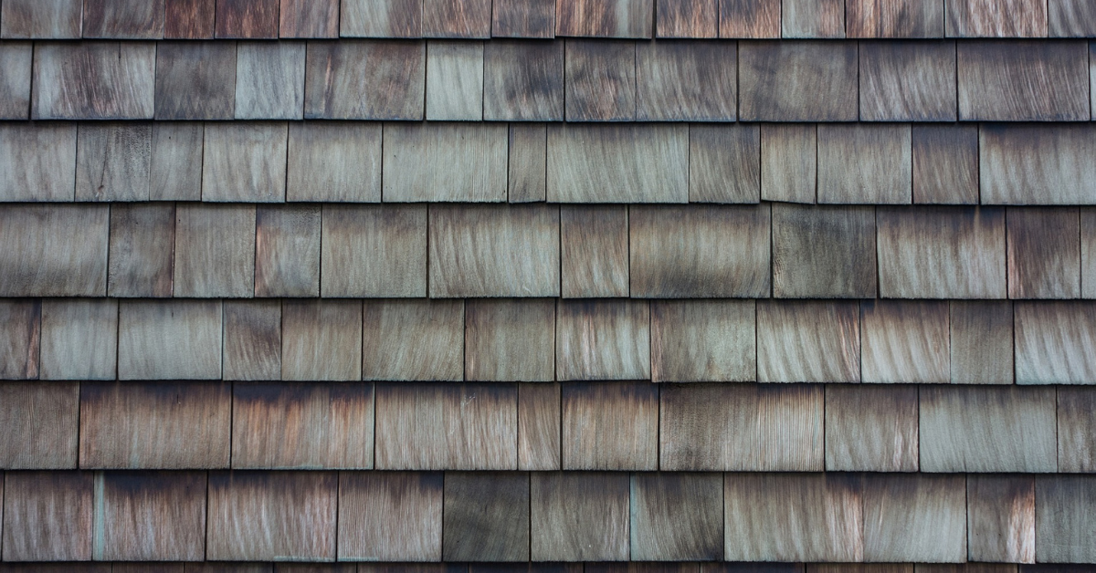 An image of grey roof shingles.